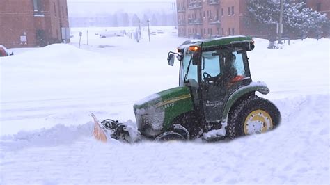 track loader stuck in snow